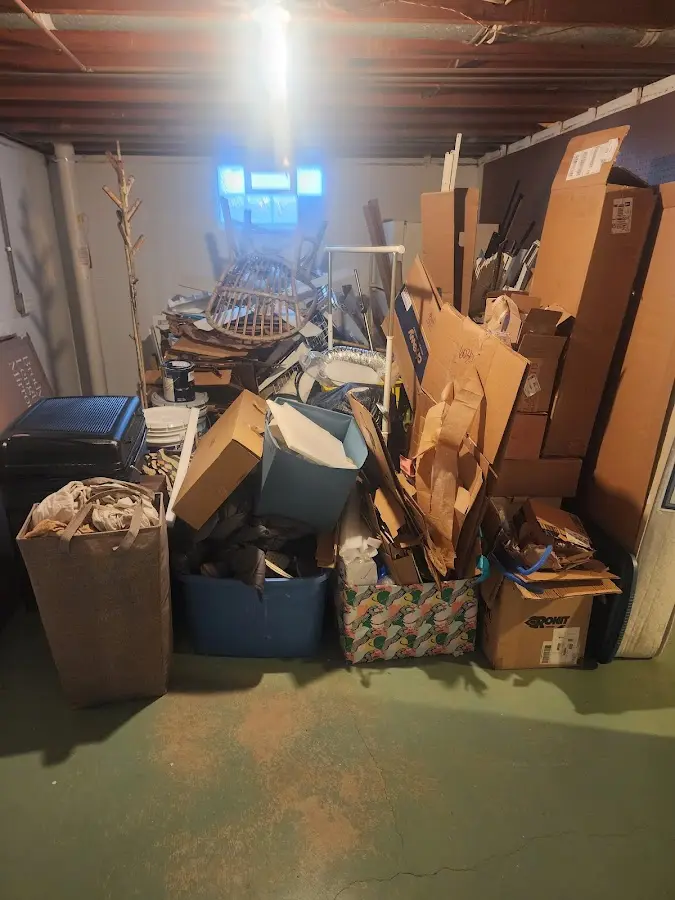 Roll-off dumpster container at job site for 15 Yard Dumpster Rental in Stanhope